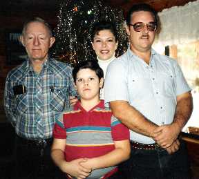 Dad with Hal and Jason, visiting at Christmas '80s