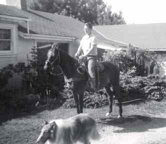Hal on horse, with Laddie, Fort Bragg